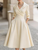 Vestido midi de fiesta con escote en V y cintura marcada