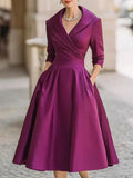 Vestido midi de fiesta con escote en V y cintura marcada
