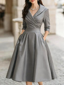 Vestido midi de fiesta con escote en V y cintura marcada