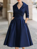 Vestido midi de fiesta con escote en V y cintura marcada
