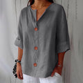 Camisa de mujer con escote en V y botones de madera