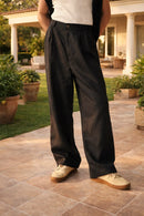 Pantalón de lino de hombre de pierna ancha con pliegues