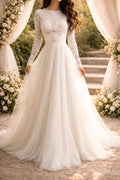 Vestido de novia largo con corpiño de encaje y manga larga