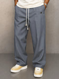 Pantalón ancho de hombre con cordón y pliegues