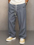 Pantalón ancho de hombre con cordón y pliegues