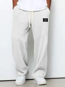 Pantalón ancho de hombre con cordón ajustable y bolsillos
