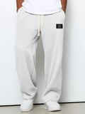 Pantalón casual de hombre de corte relajado y cintura ajustable