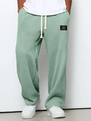 Pantalón casual de hombre de corte relajado y cintura ajustable