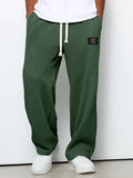 Pantalón ancho de hombre con cordón ajustable y bolsillos