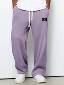 Pantalón ancho de hombre con cordón ajustable y bolsillos