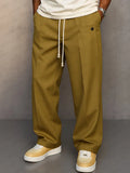Pantalón ancho de hombre con cordón y pliegues