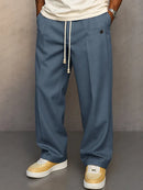 Pantalón ancho de hombre con cordón y pliegues