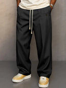 Pantalón ancho de hombre con cordón y pliegues
