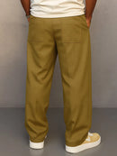 Pantalón ancho de hombre con cordón y pliegues