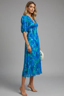 Vestido midi de mujer con escote en V y mangas abullonadas