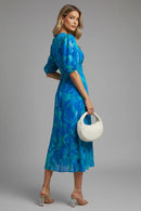 Vestido midi de mujer con escote en V y mangas abullonadas