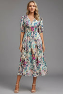 Vestido midi de mujer con escote en V y mangas abullonadas