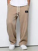 Pantalón ancho de hombre con cordón ajustable y bolsillos