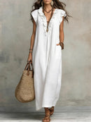 Vestido boho largo de mujer de corte fluido con volantes
