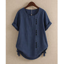 Blusa de algodón de manga corta con botones asimétricos