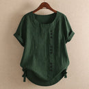 Blusa de algodón de manga corta con botones asimétricos