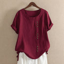 Blusa de algodón de manga corta con botones asimétricos
